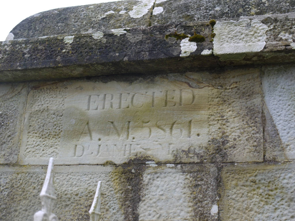 Right hand gatepost has the English inscription