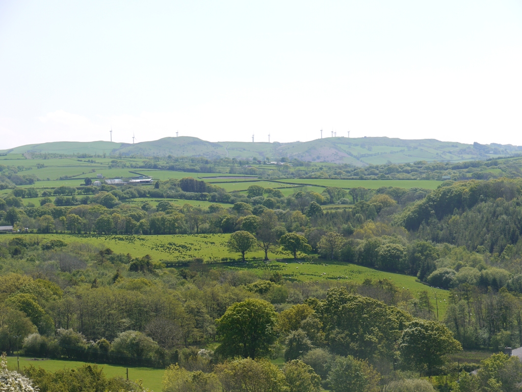 Wind turbines on the skyline of Mynydd Bach, six miles to the south