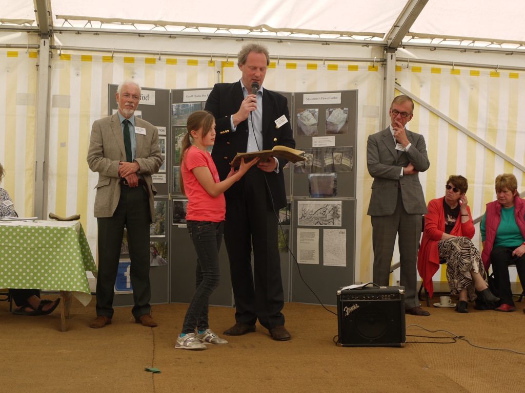 Giles Inglis Jones, assisted by his daughter, reads an extract from Richard Payne Knight's poem The Landscape a didactic poem (1794)  in praise of the Picturesque to the guests of the Hafod Trust.