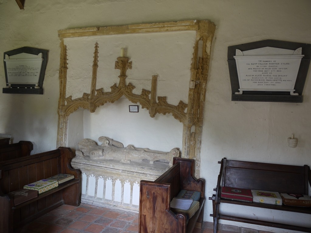 On either side of the medieval tomb of Maliphant are the memorial to the Evans triplets, and to the eldest, W.P. Evans and his wife.